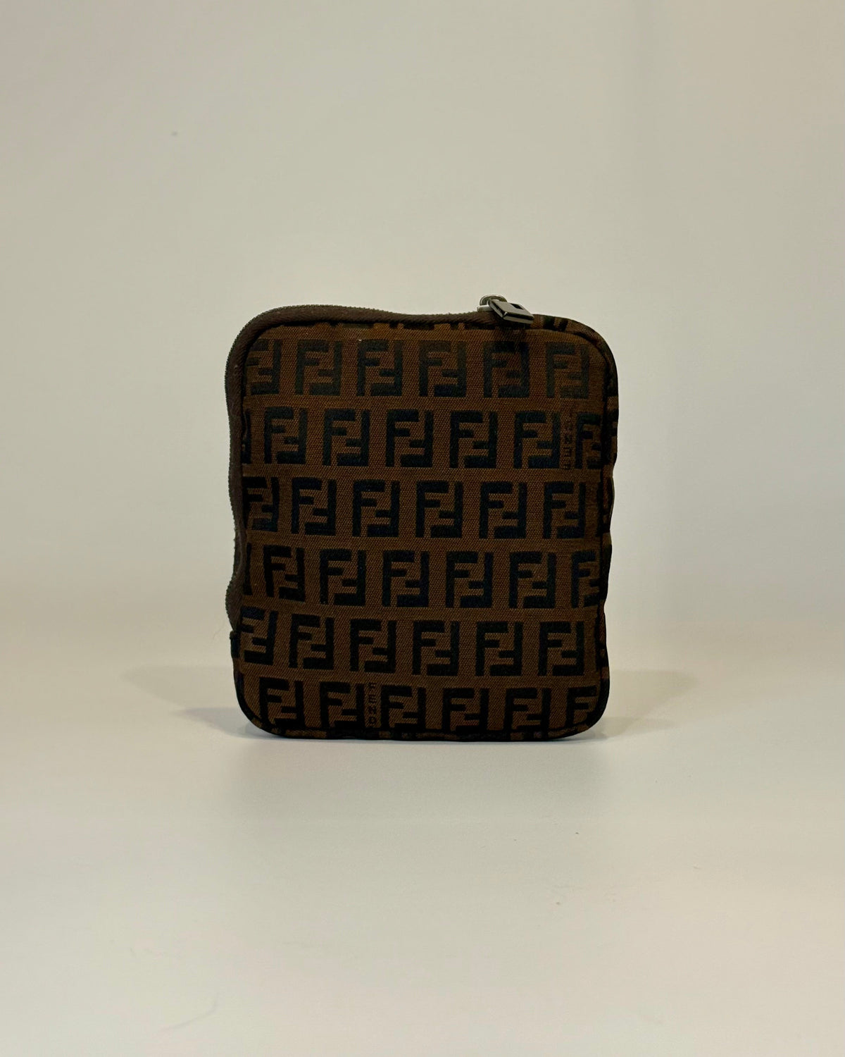 Fendi brown zip pouch featuring the iconic FF monogram pattern