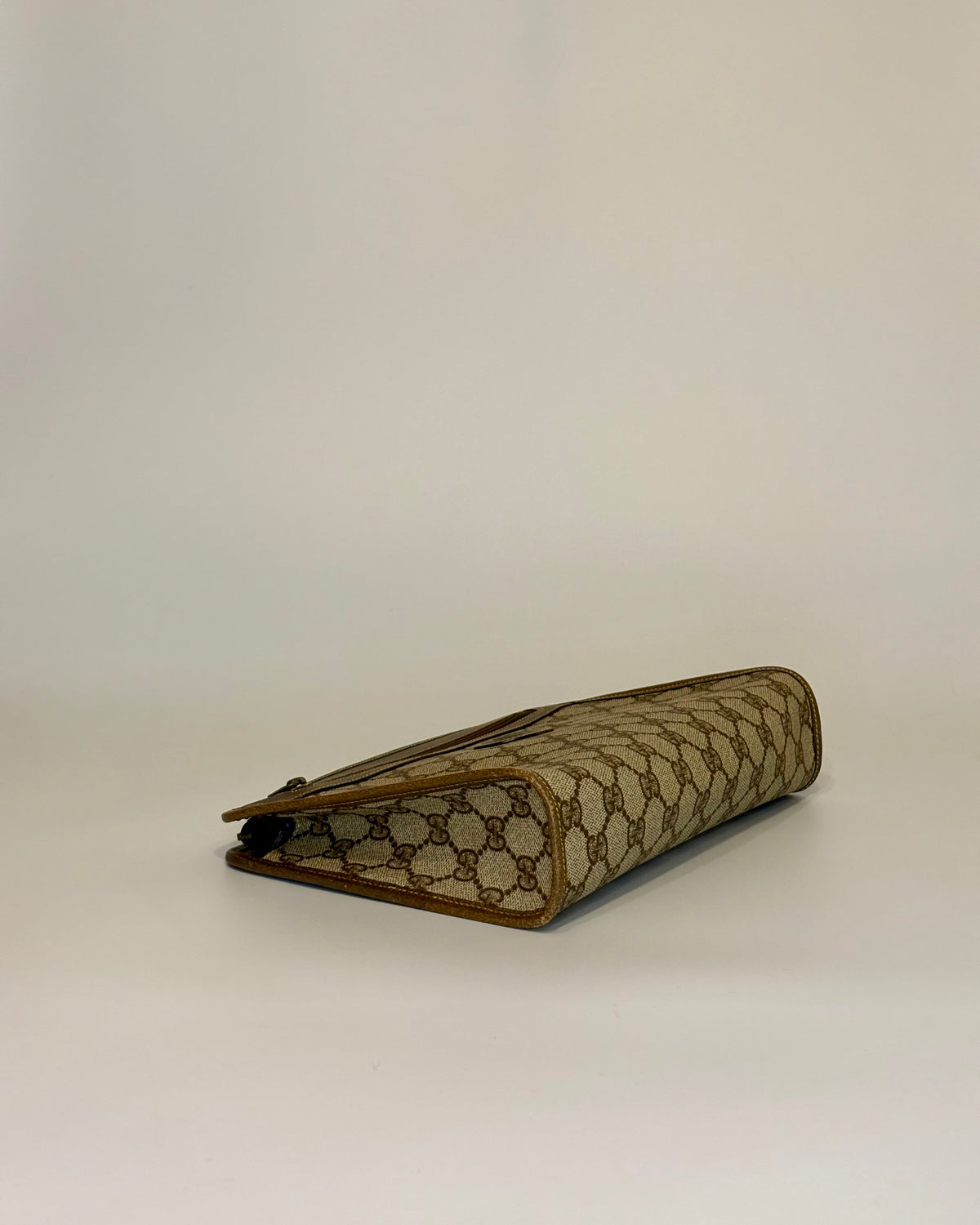 The clean lines and balanced proportions highlight the understated luxury of this vintage Gucci accessory.